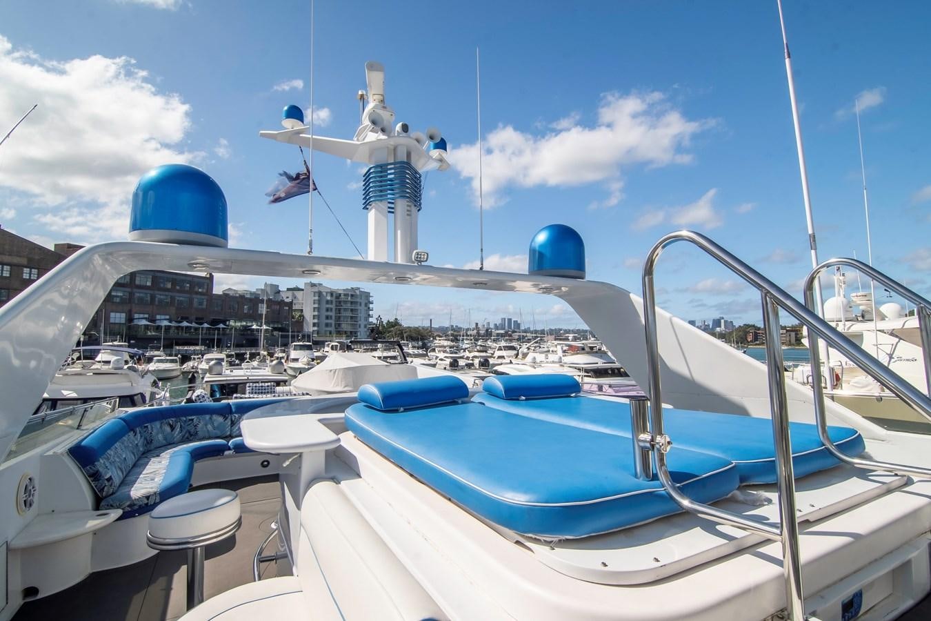 a boat with a blue canopy aboard LADY AUDREY Yacht for Sale