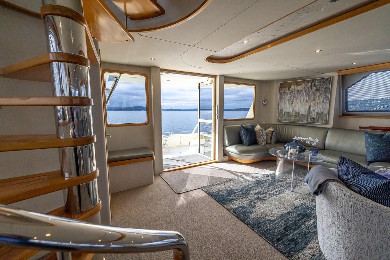 a living room with a large window aboard WHITE LIGHTNING Yacht for Sale