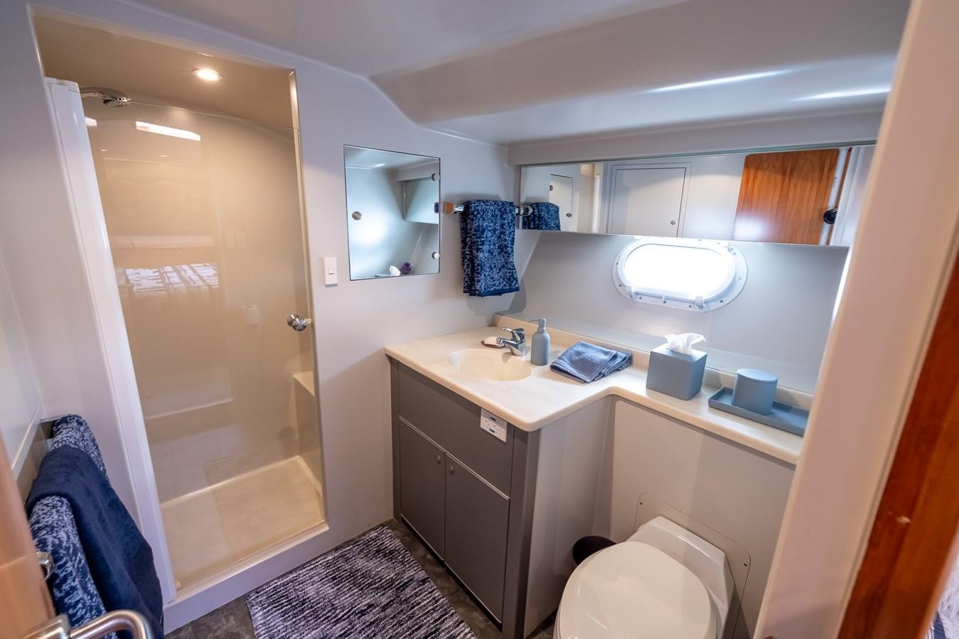 a bathroom with a sink and a toilet aboard WHITE LIGHTNING Yacht for Sale
