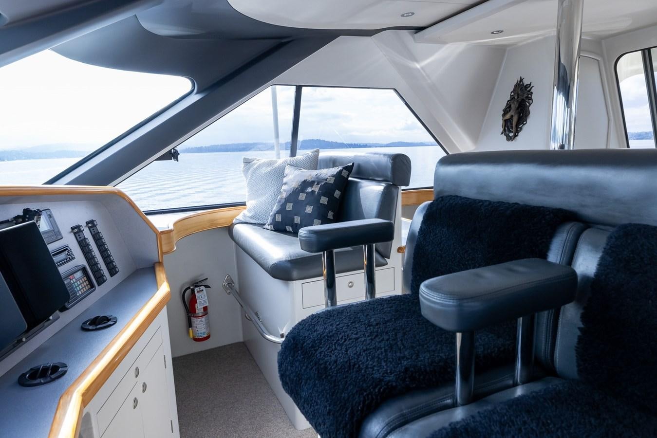 inside of a car aboard WHITE LIGHTNING Yacht for Sale