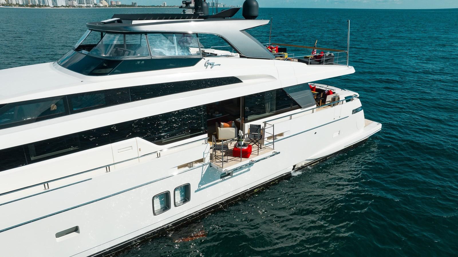 a white yacht in the water aboard FIFTY SHADES Yacht for Sale