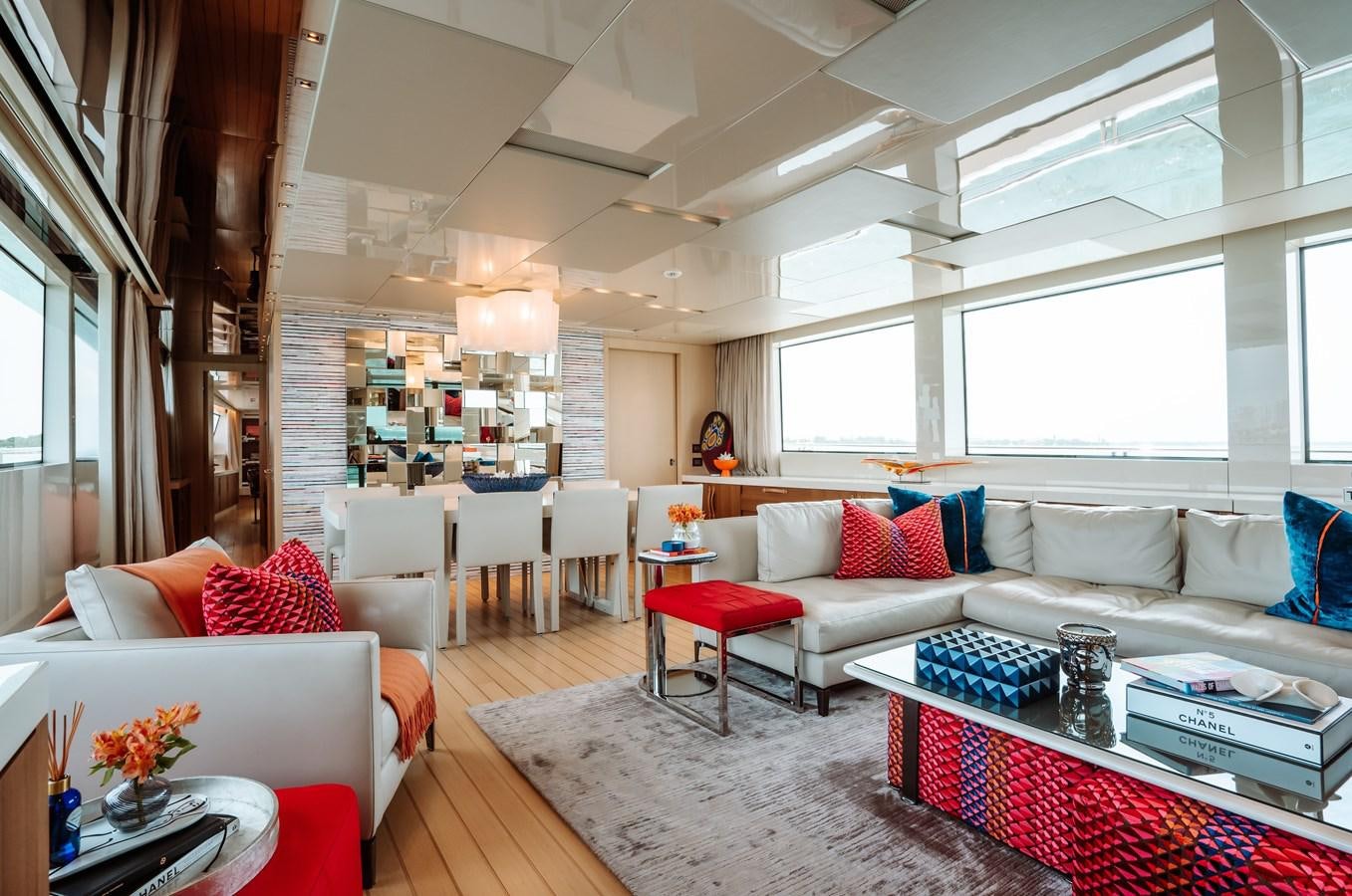 a living room with a couch and a table aboard FIFTY SHADES Yacht for Sale
