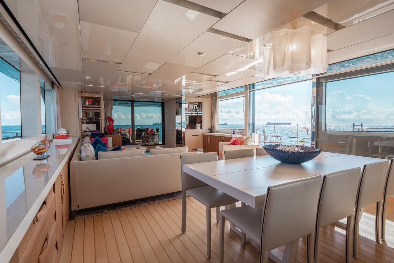a modern looking kitchen with a large open window aboard FIFTY SHADES Yacht for Sale
