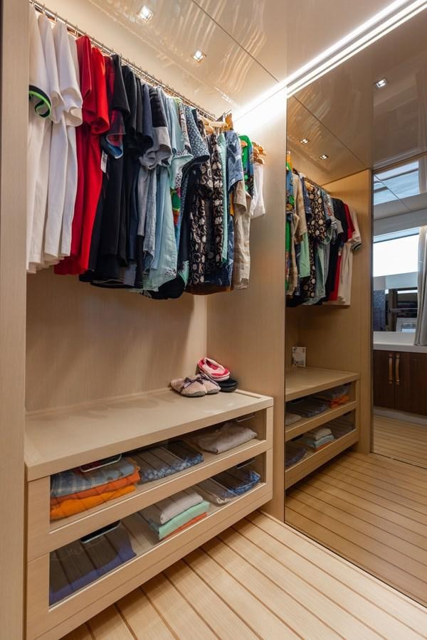 a closet full of clothes aboard FIFTY SHADES Yacht for Sale