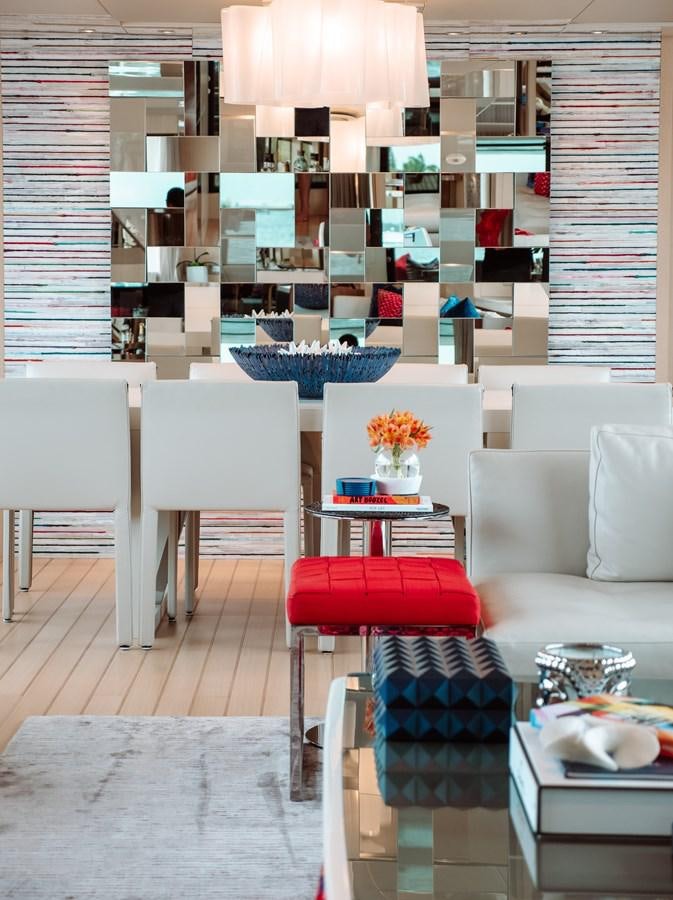 a room with a couch and chairs aboard FIFTY SHADES Yacht for Sale