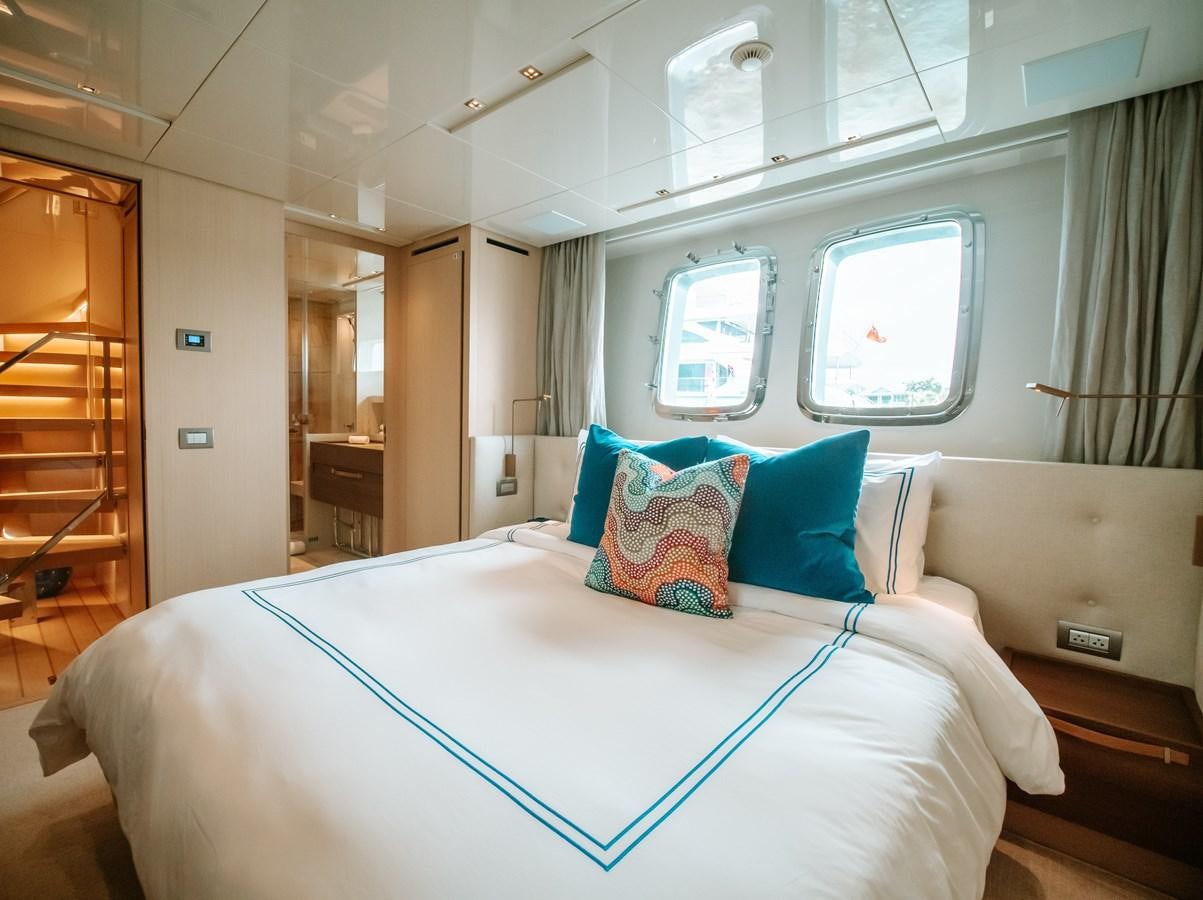 a bed in a room aboard FIFTY SHADES Yacht for Sale