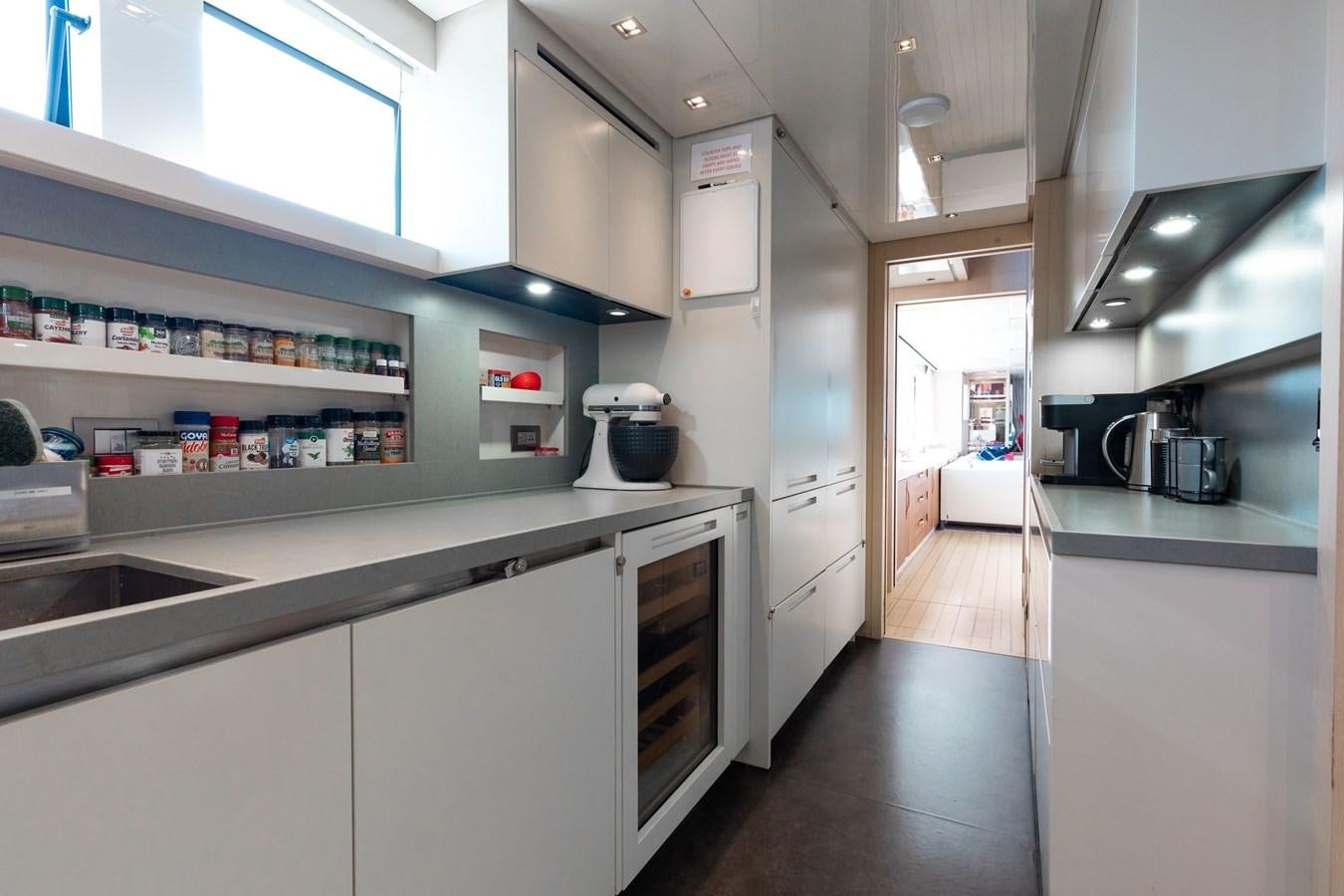 a kitchen with a lot of counter space aboard FIFTY SHADES Yacht for Sale