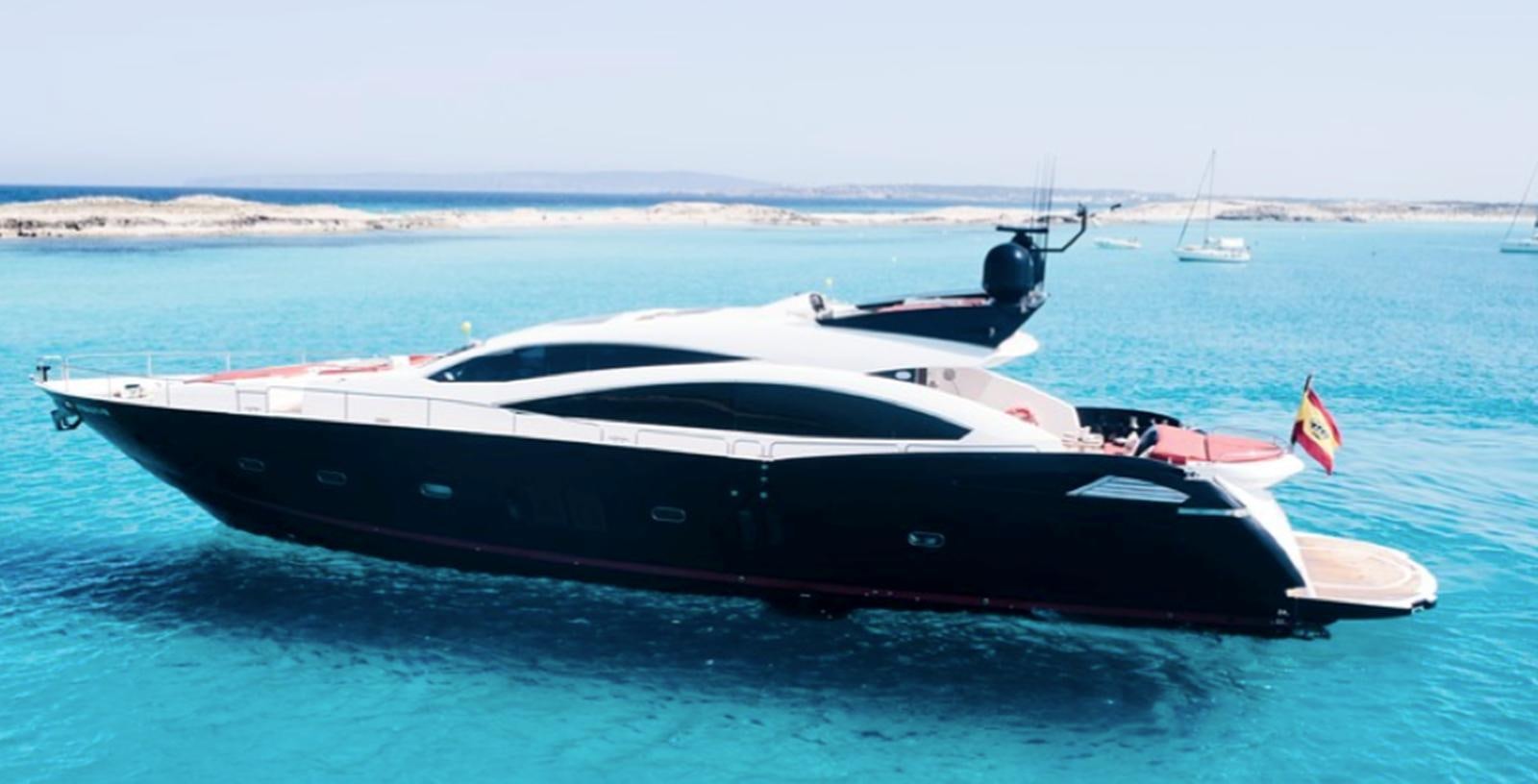 a white yacht on the water aboard UM7 Yacht for Sale
