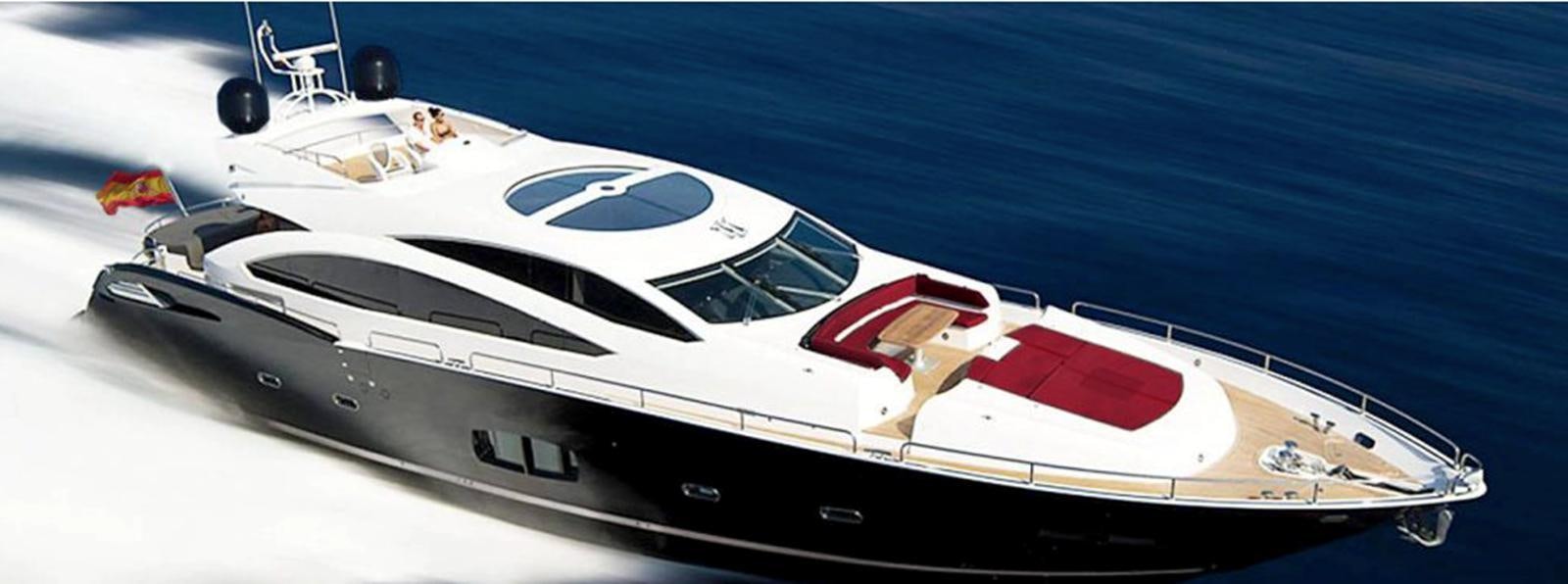 a white and red race car aboard UM7 Yacht for Sale