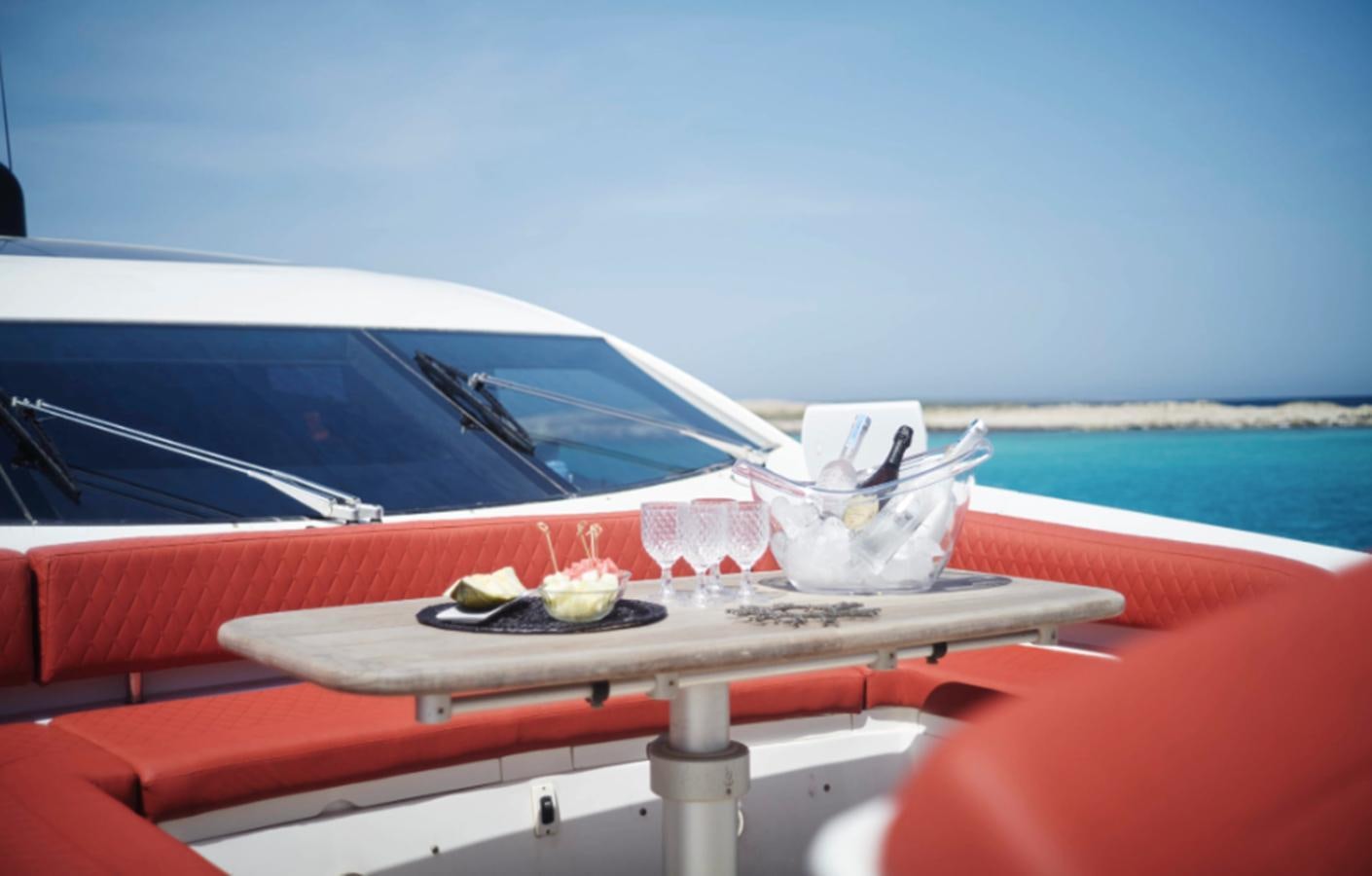 a tray with food on it by a boat aboard UM7 Yacht for Sale