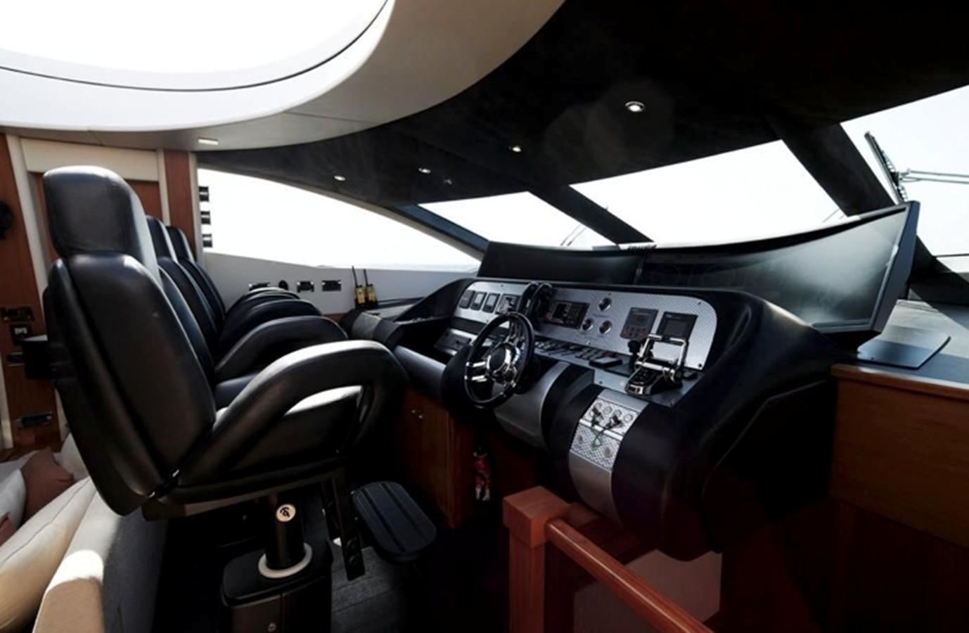 the inside of a car aboard UM7 Yacht for Sale