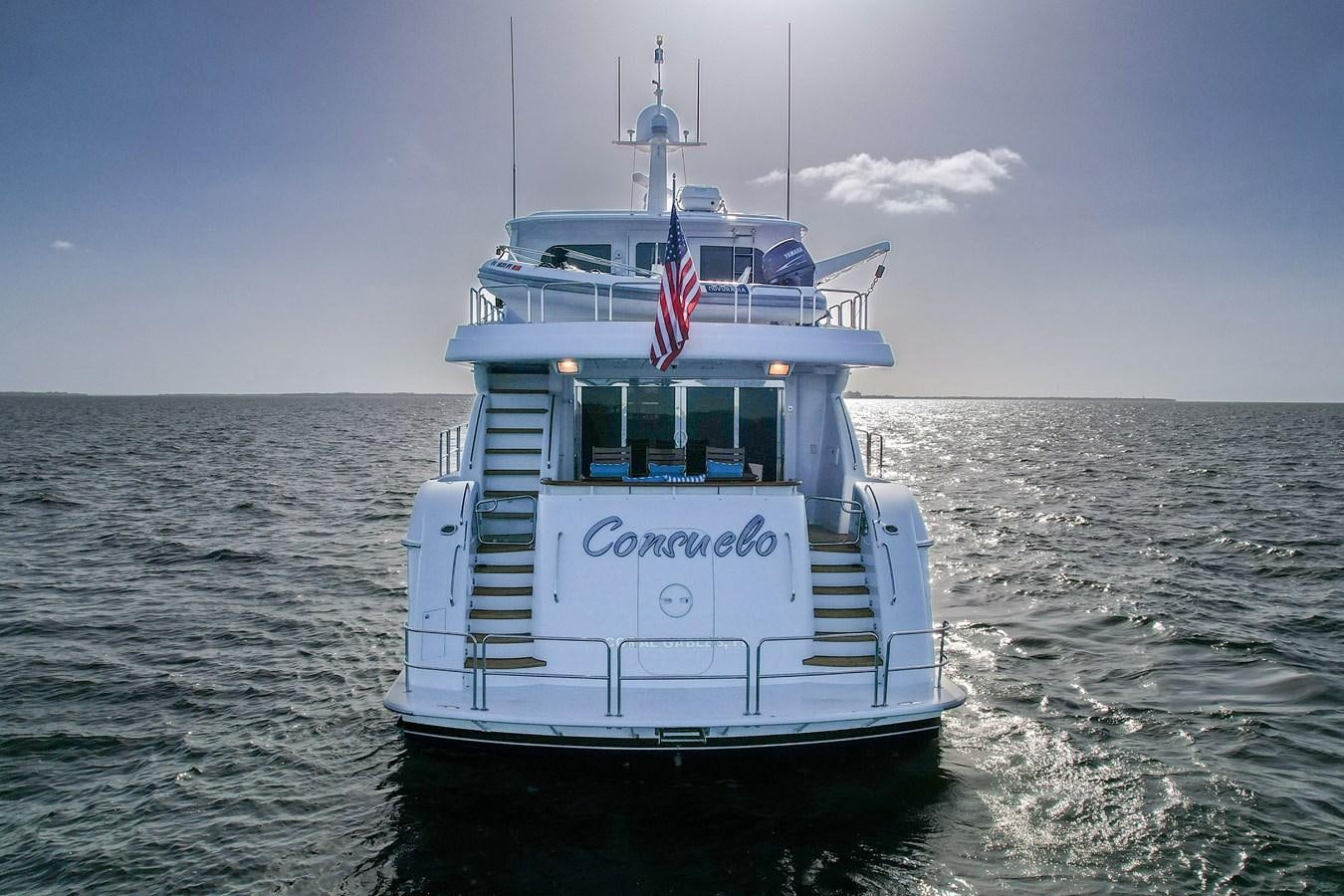 a boat in the water aboard HATTERAS 80 MOTOR Yacht for Sale