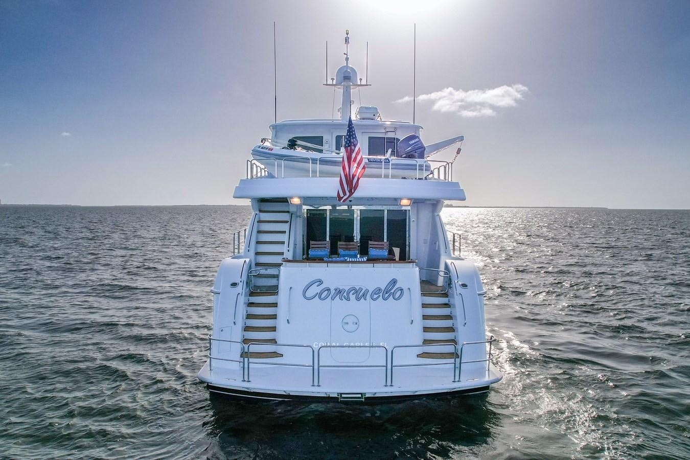 a boat in the water aboard HATTERAS 80 MOTOR Yacht for Sale