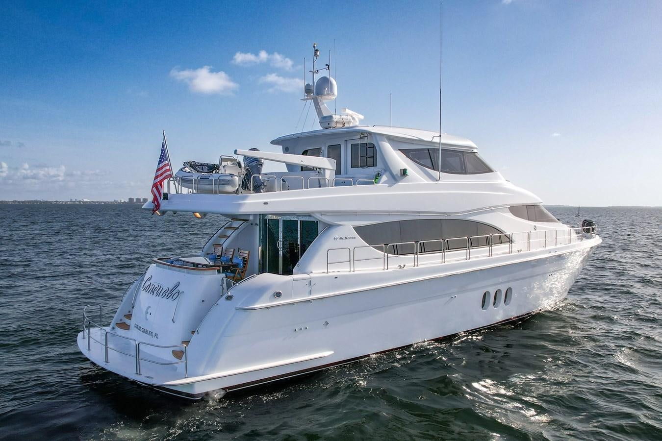 a boat on the water aboard HATTERAS 80 MOTOR Yacht for Sale