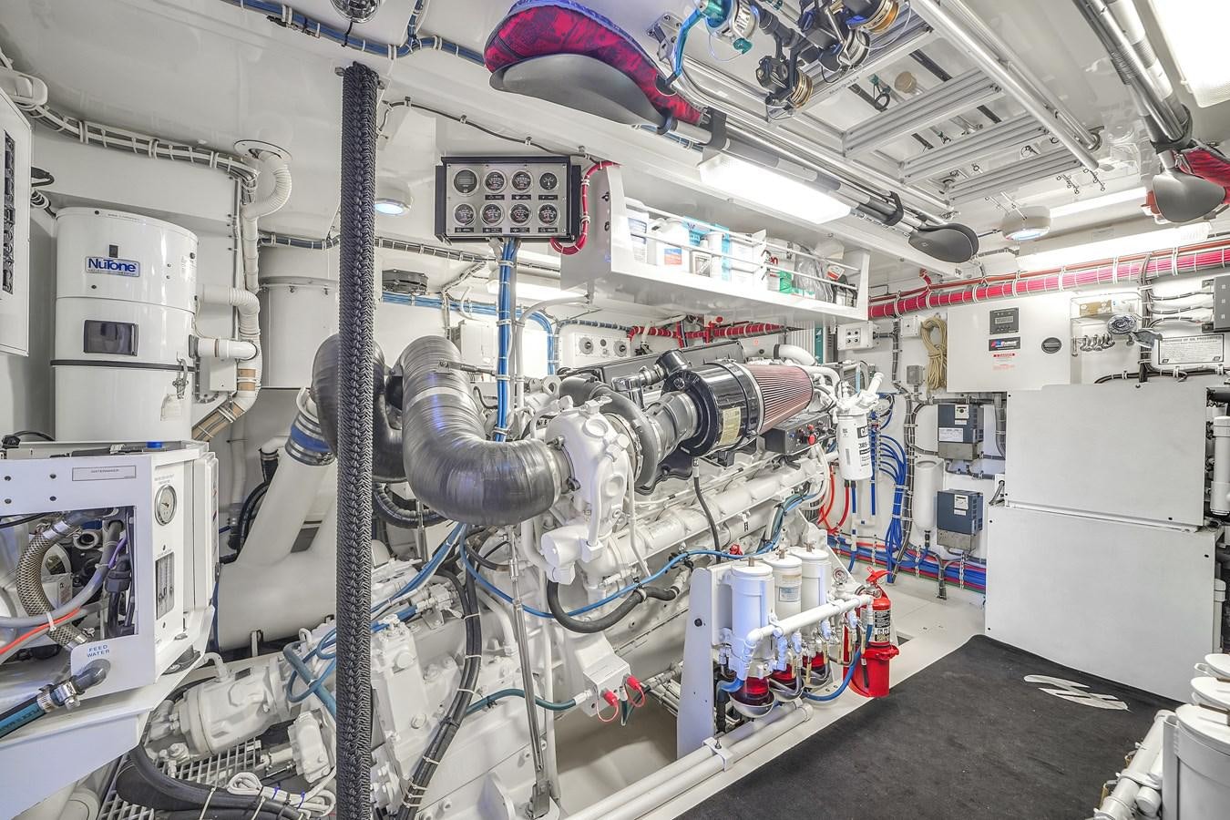 a machine with wires aboard HATTERAS 80 MOTOR Yacht for Sale