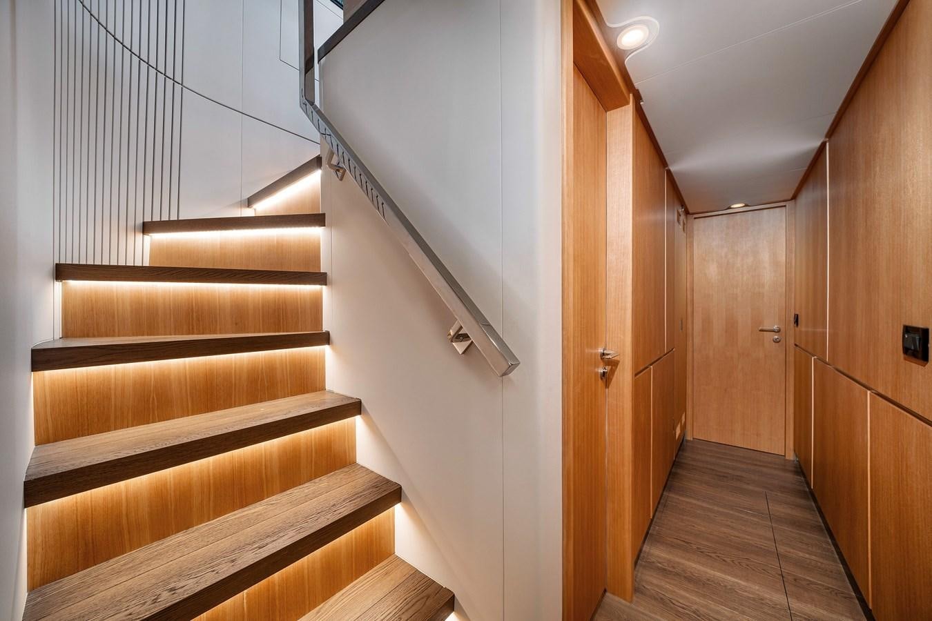 a staircase in a building aboard CLB 72 Yacht for Sale