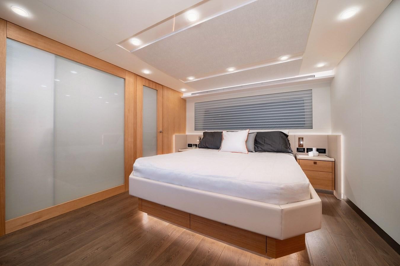 a bed in a room aboard CLB 72 Yacht for Sale