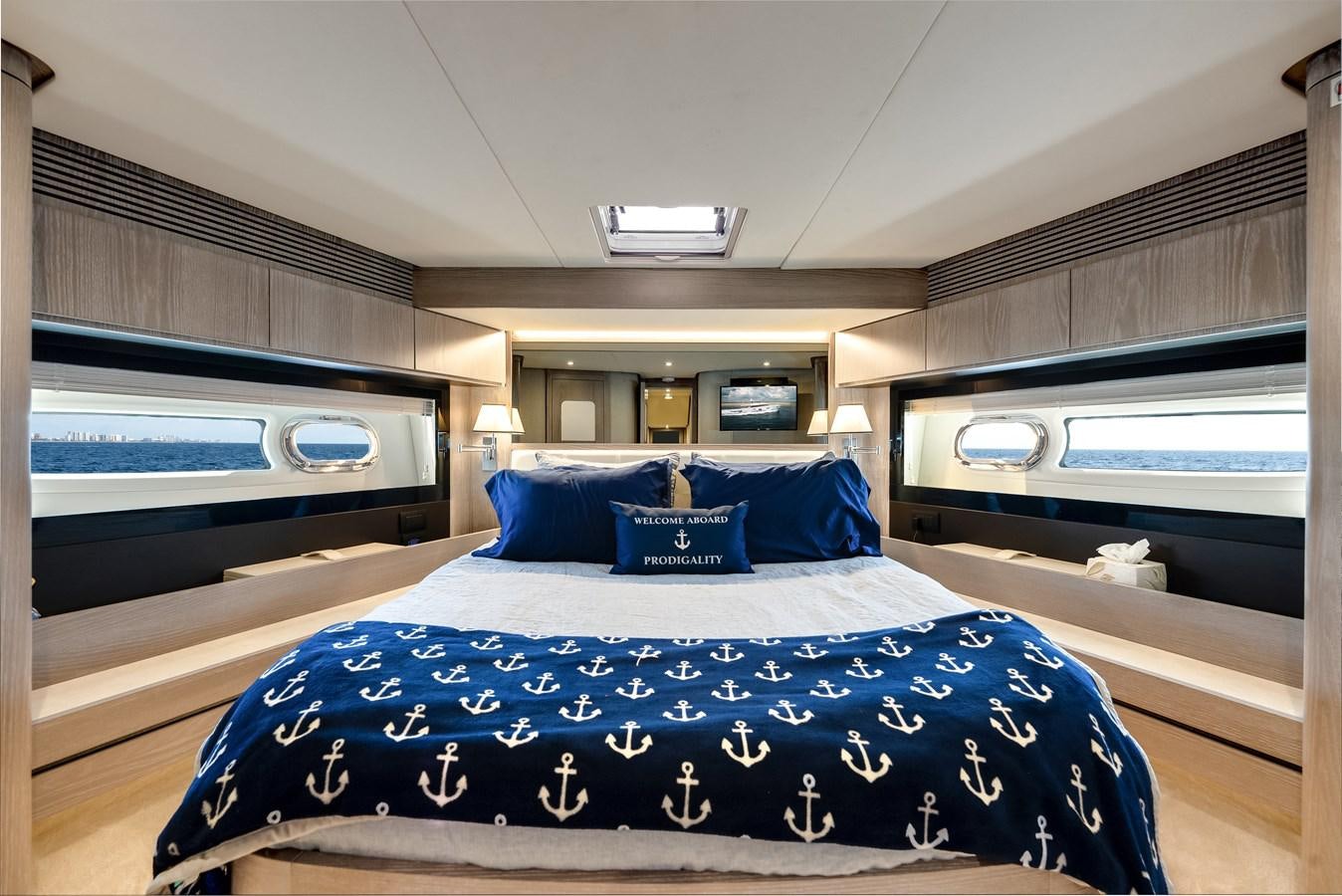 a bed in a room aboard PRODIGALITY 4 Yacht for Sale