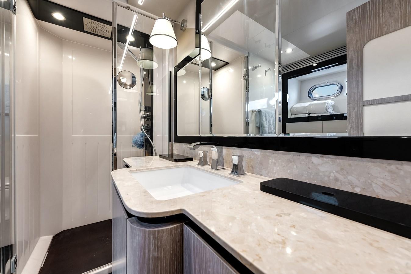 a bathroom with sinks and mirrors aboard PRODIGALITY 4 Yacht for Sale
