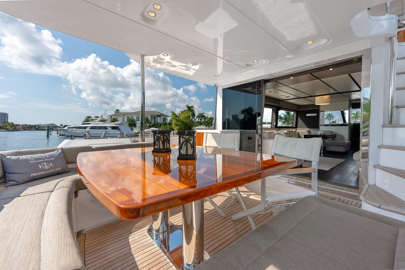 a table and chairs on a boat aboard PRODIGALITY 4 Yacht for Sale