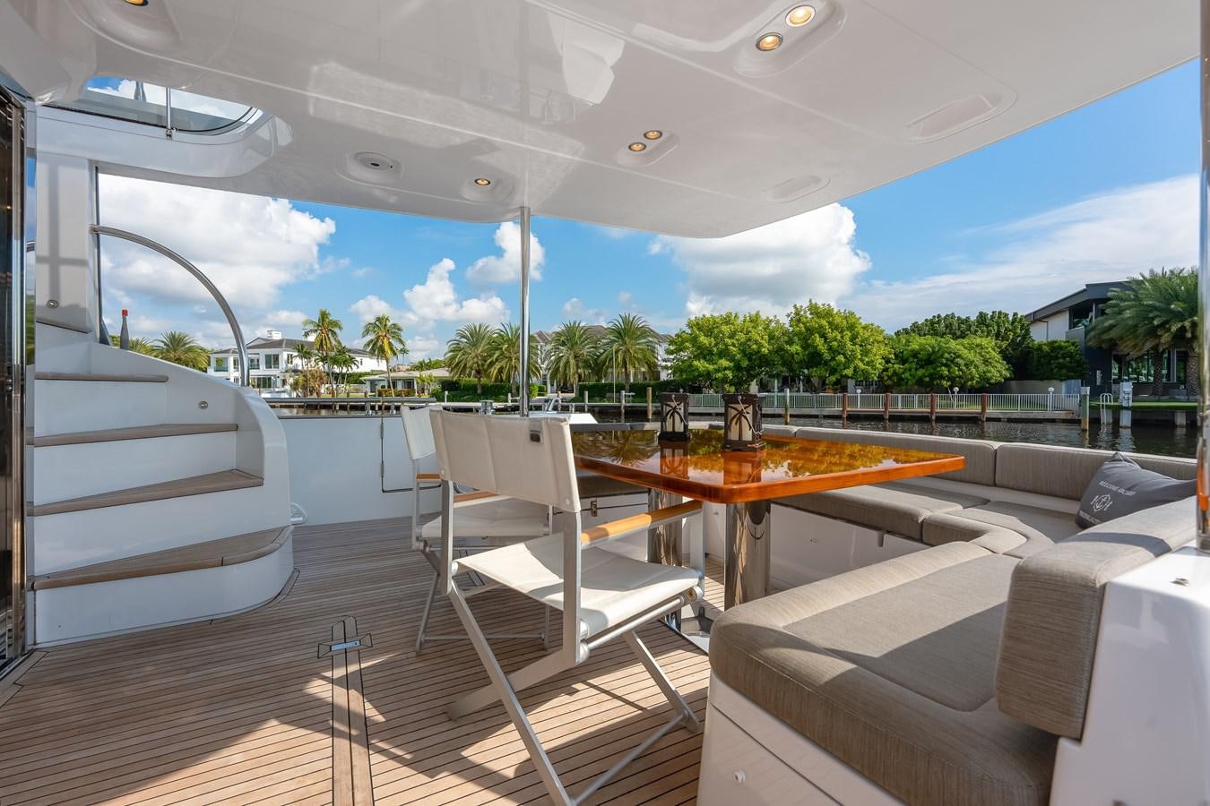 a room with a table and chairs aboard PRODIGALITY 4 Yacht for Sale