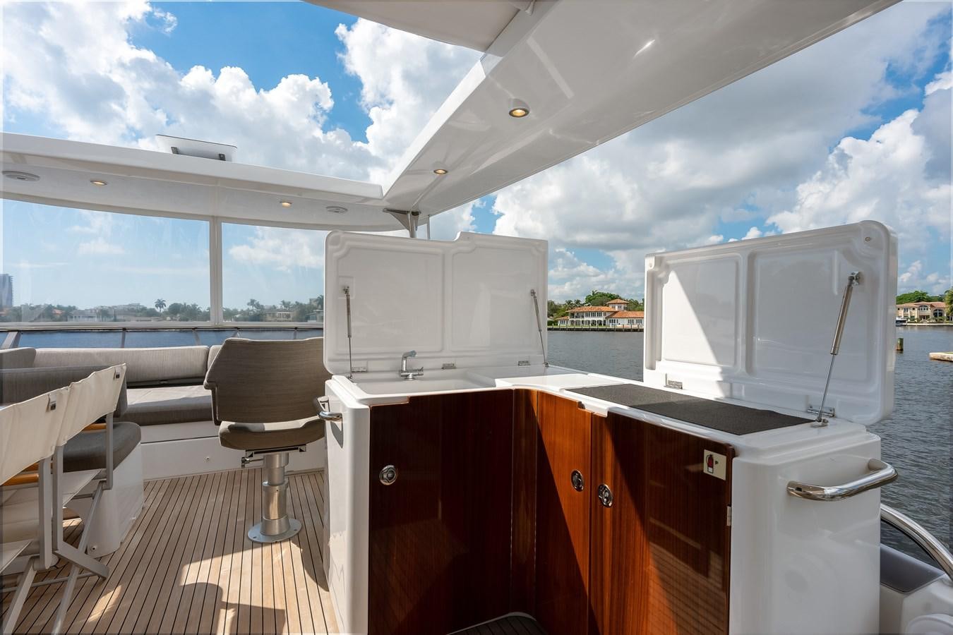 a boat with a desk and chairs aboard PRODIGALITY 4 Yacht for Sale