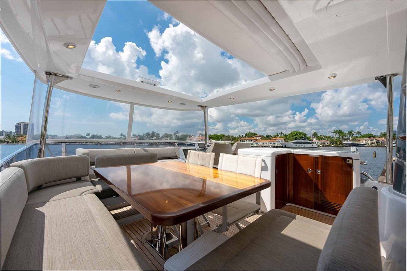a large room with a view of the water and the city aboard PRODIGALITY 4 Yacht for Sale