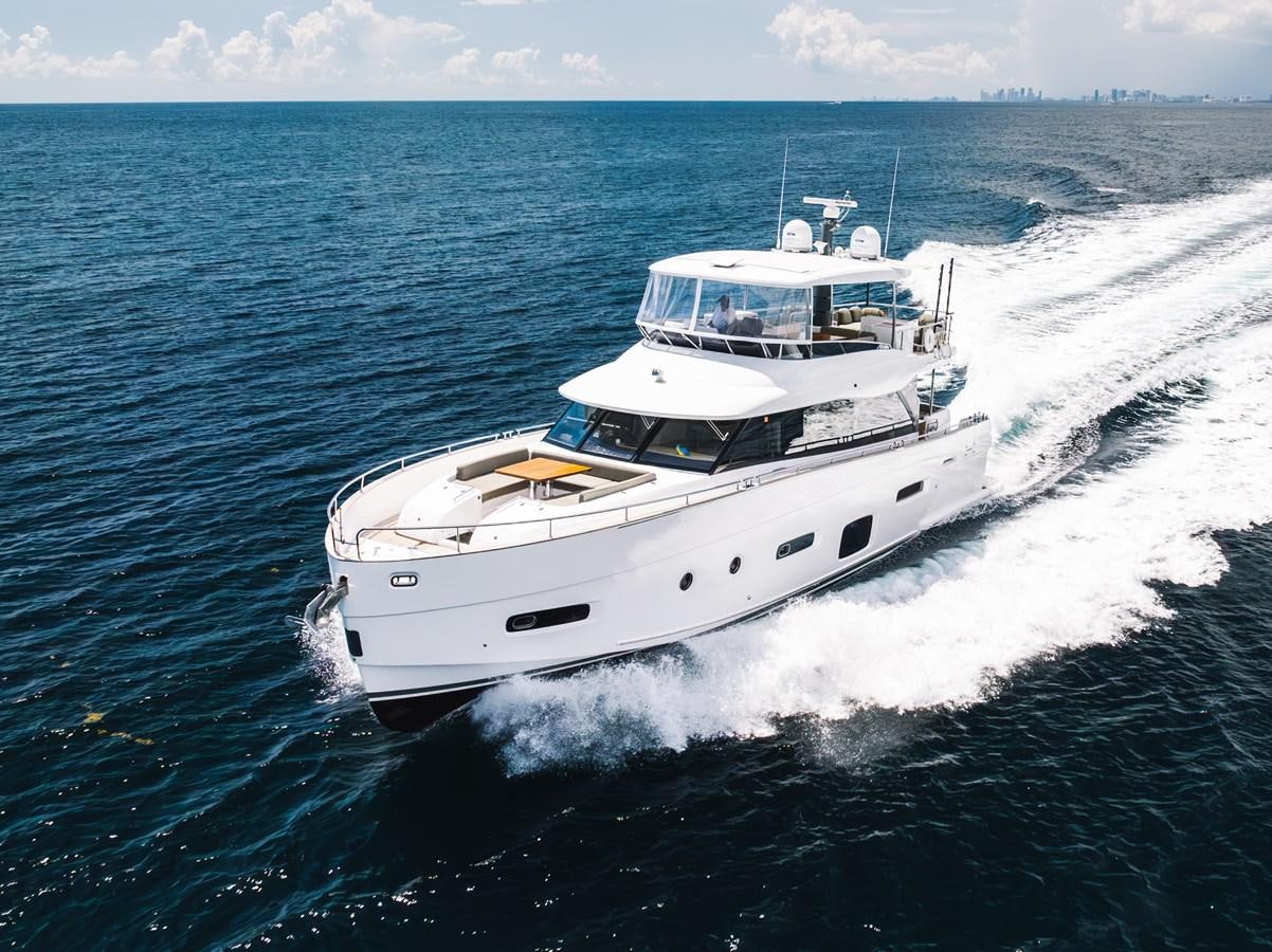 a white boat on the water aboard PRODIGALITY 4 Yacht for Sale