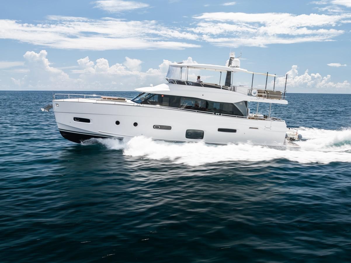 a white yacht in the water aboard PRODIGALITY 4 Yacht for Sale
