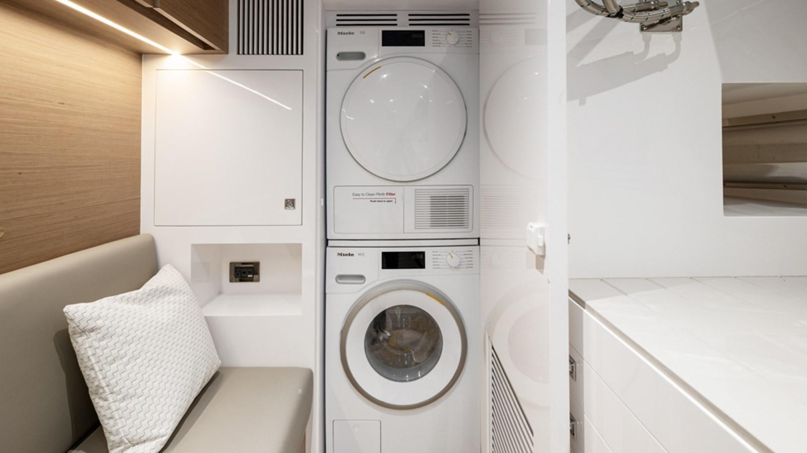 a white washing machine aboard 90 HORIZON Yacht for Sale