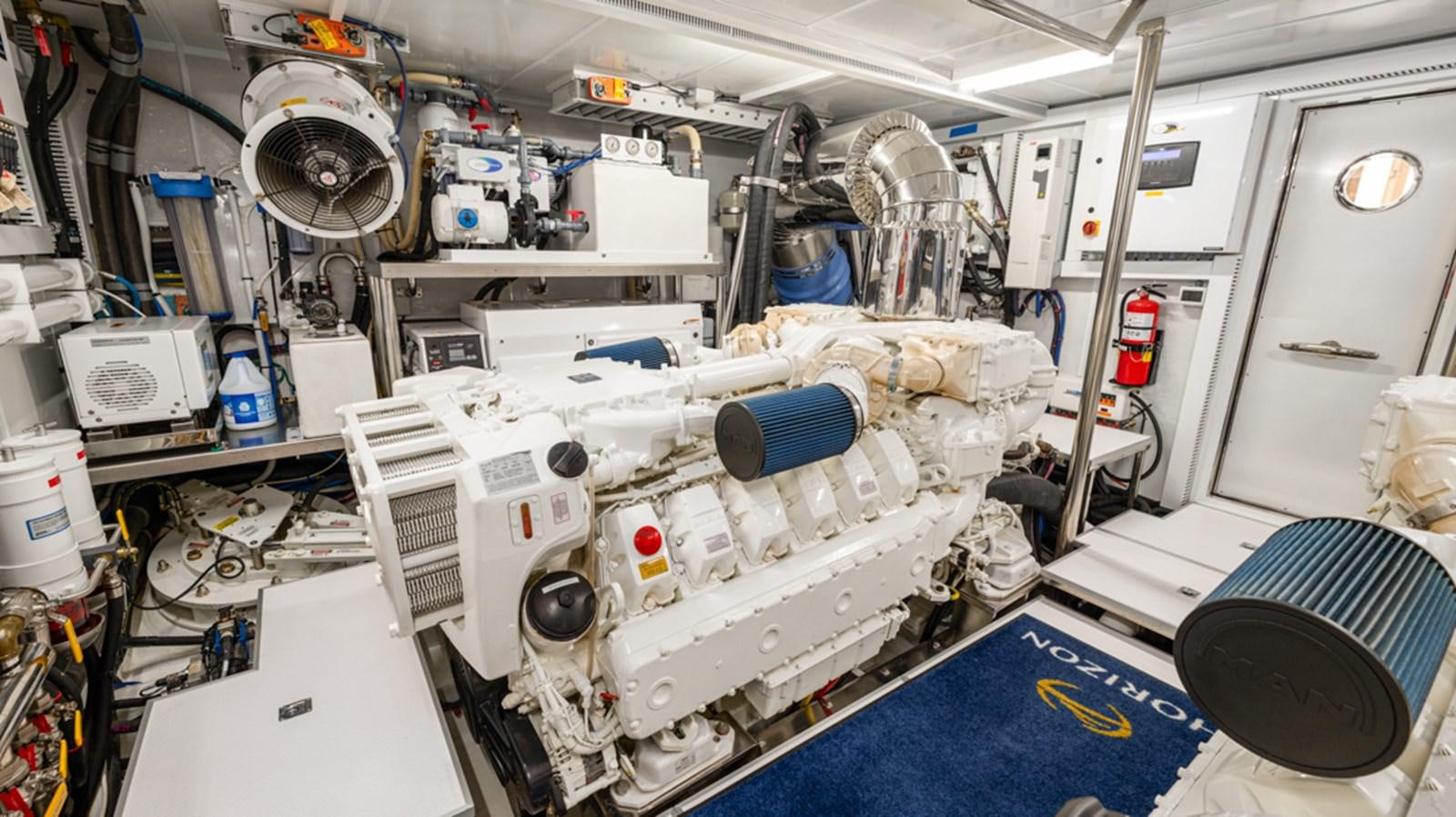 a room with a machine aboard 90 HORIZON Yacht for Sale