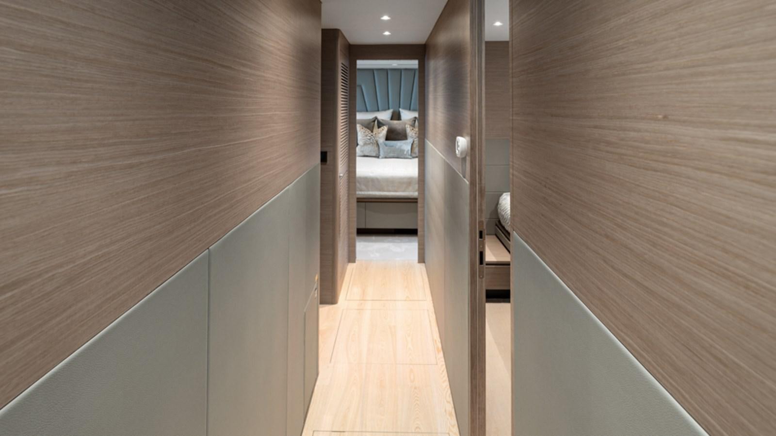 a room with a wood floor and a bed aboard 90 HORIZON Yacht for Sale
