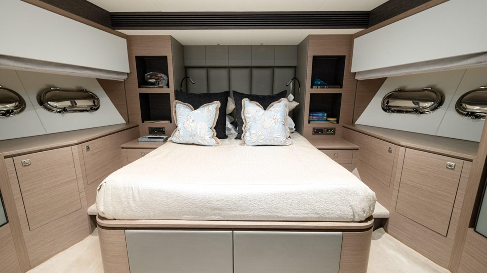 a bed in a room aboard 90 HORIZON Yacht for Sale