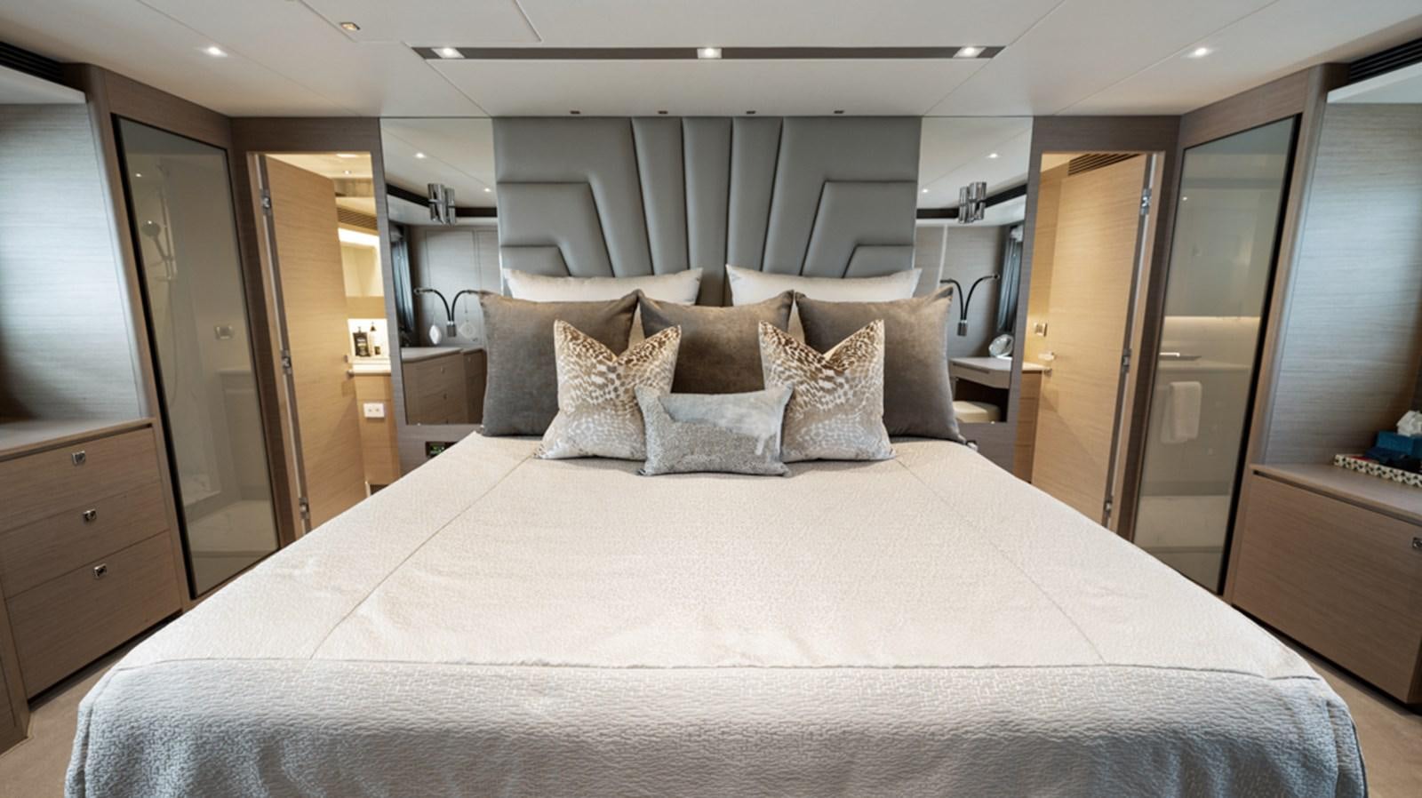 a bed in a room aboard 90 HORIZON Yacht for Sale