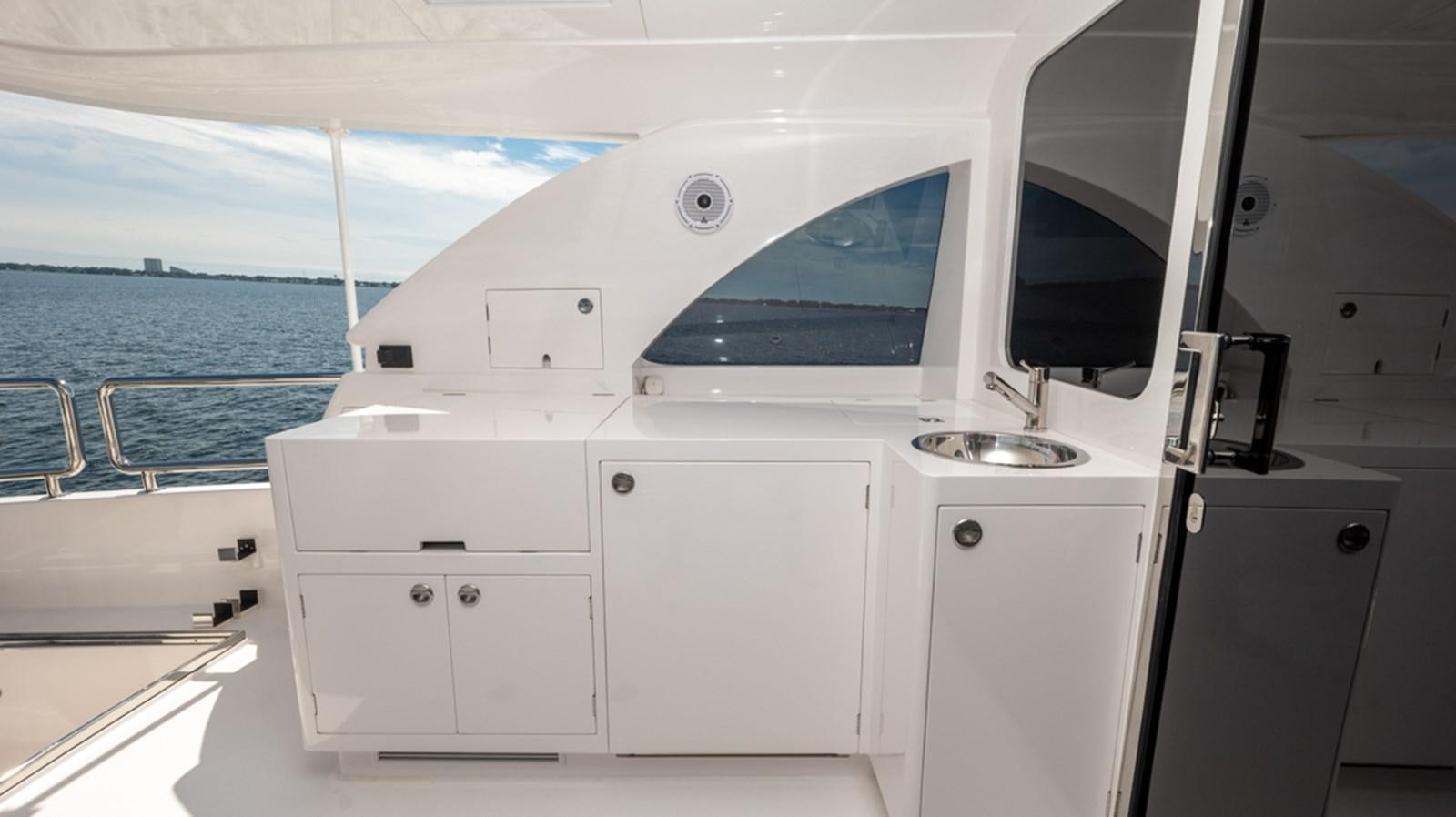 a white boat on a boat aboard 90 HORIZON Yacht for Sale