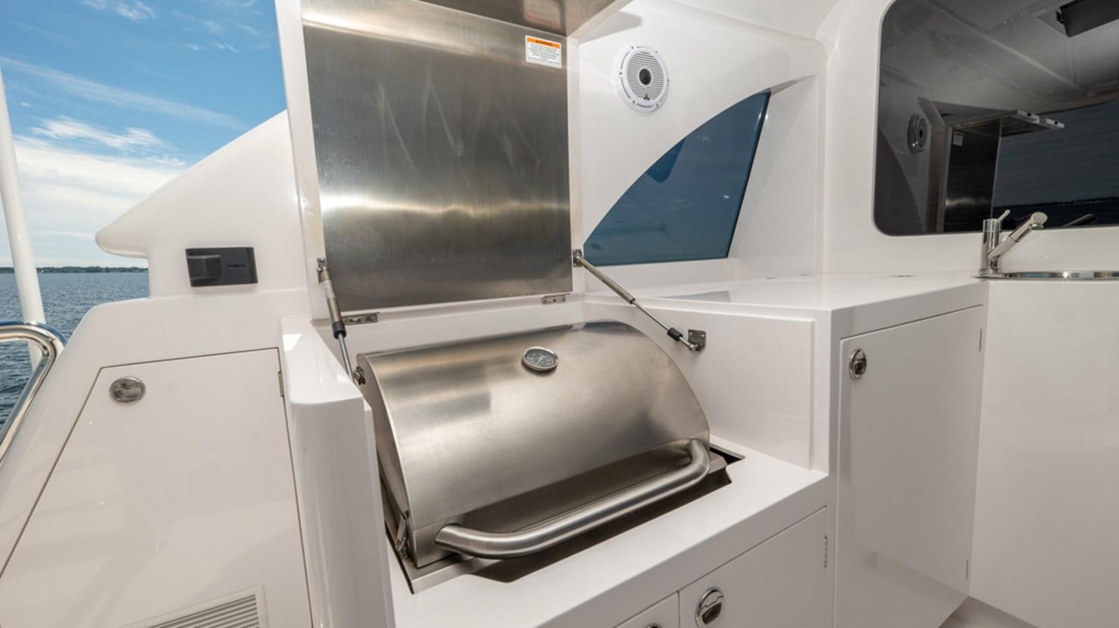 a boat with a screen aboard 90 HORIZON Yacht for Sale