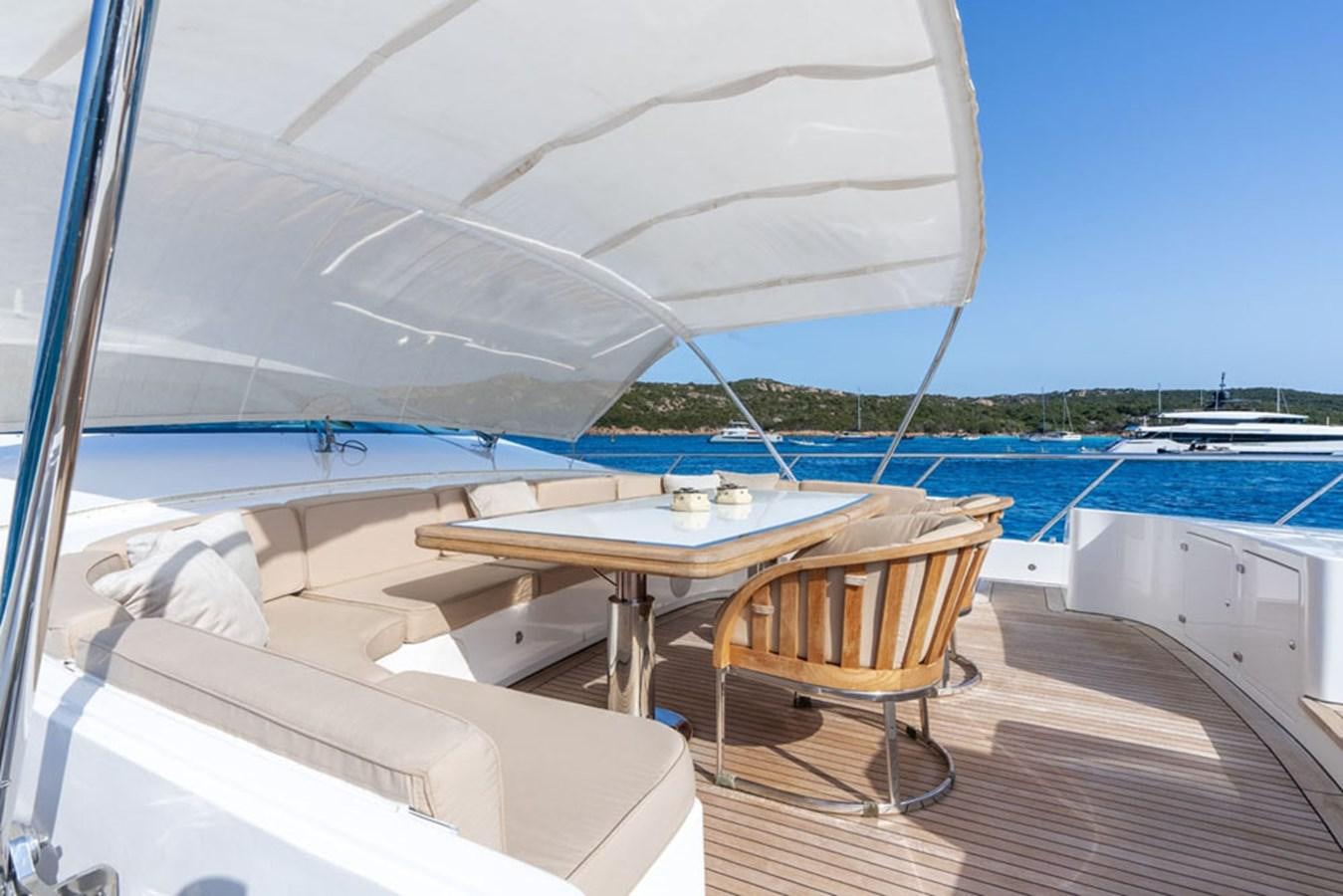 a table and chairs on a boat aboard PAULA & BIEL Yacht for Sale