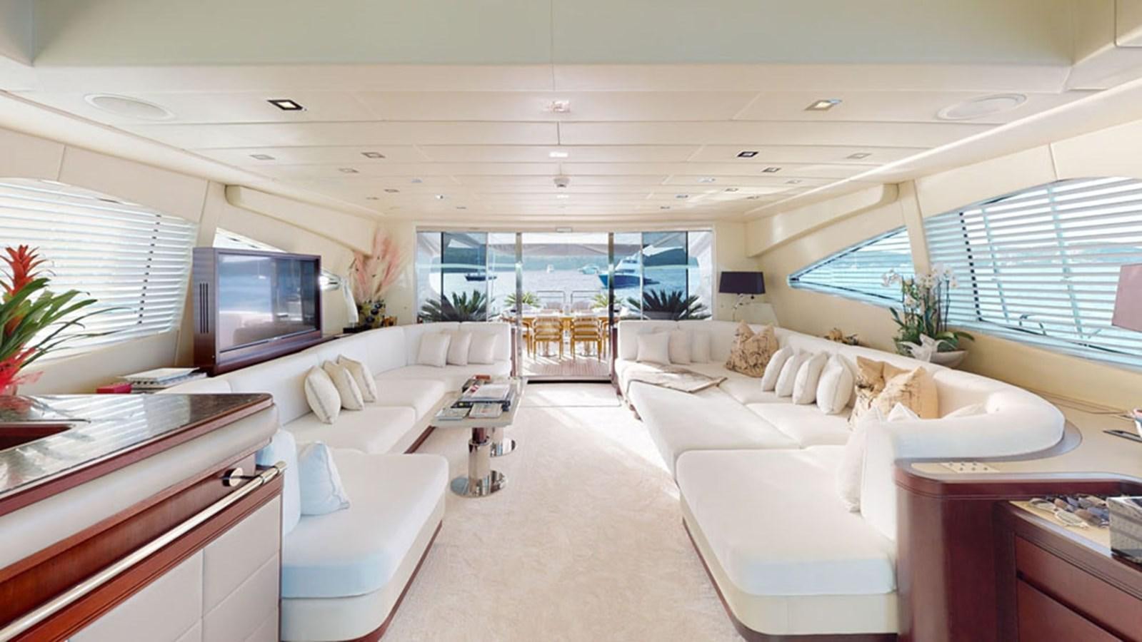 a living room with a large window aboard PAULA & BIEL Yacht for Sale