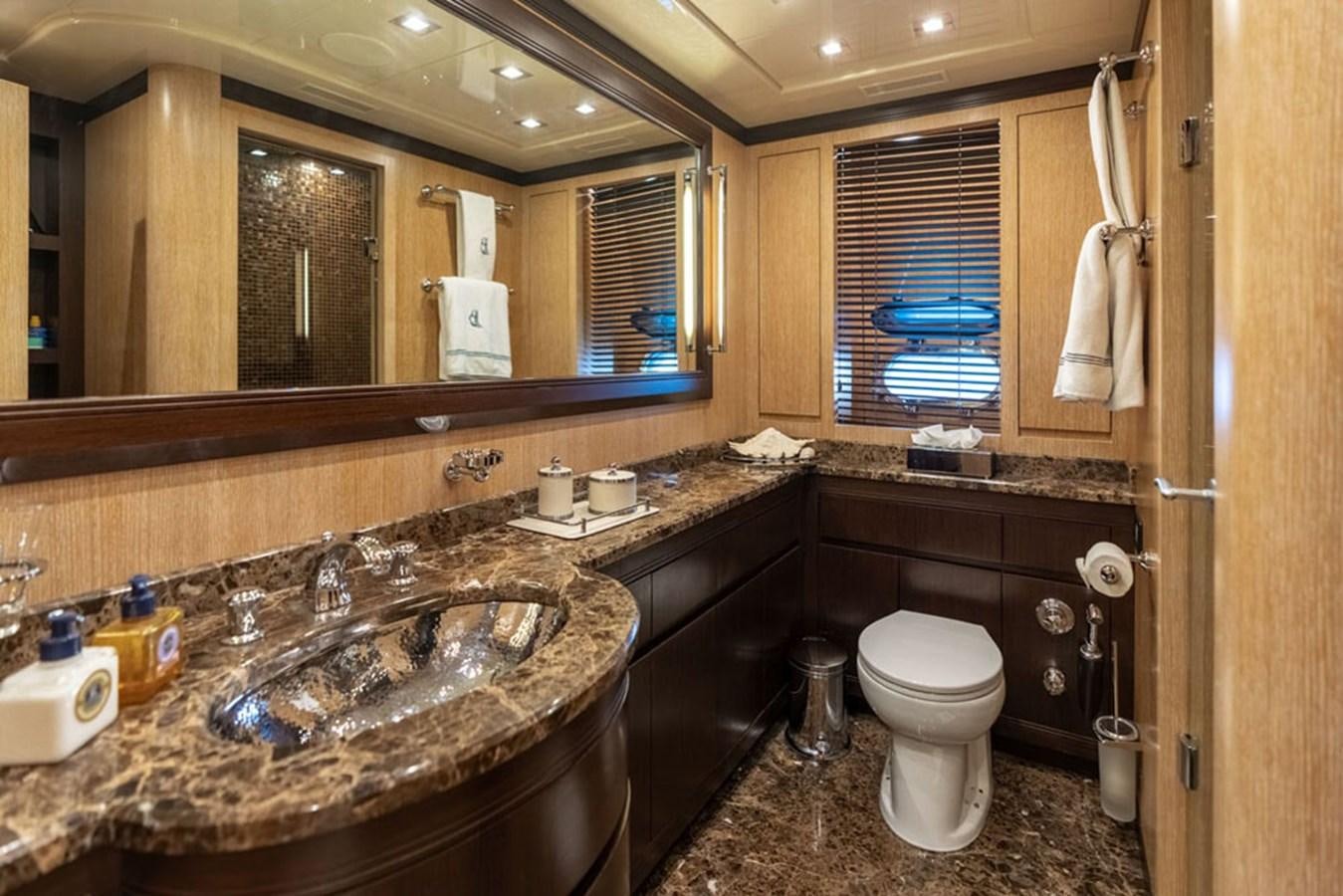 a bathroom with a sink and toilet aboard PAULA & BIEL Yacht for Sale