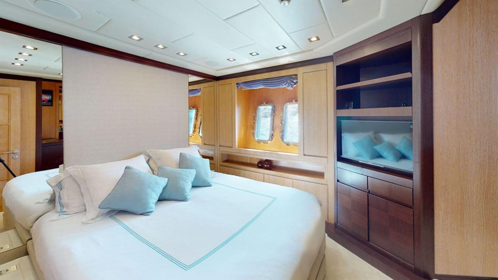 a bed in a room aboard PAULA & BIEL Yacht for Sale