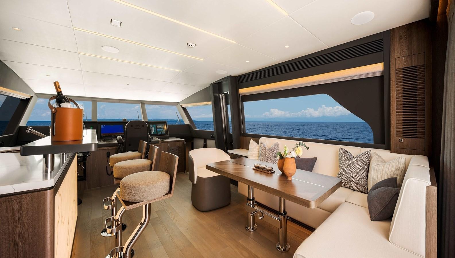 a living room with a large screen aboard HORIZON FD80-614 / NOW AVAILABLE  Yacht for Sale