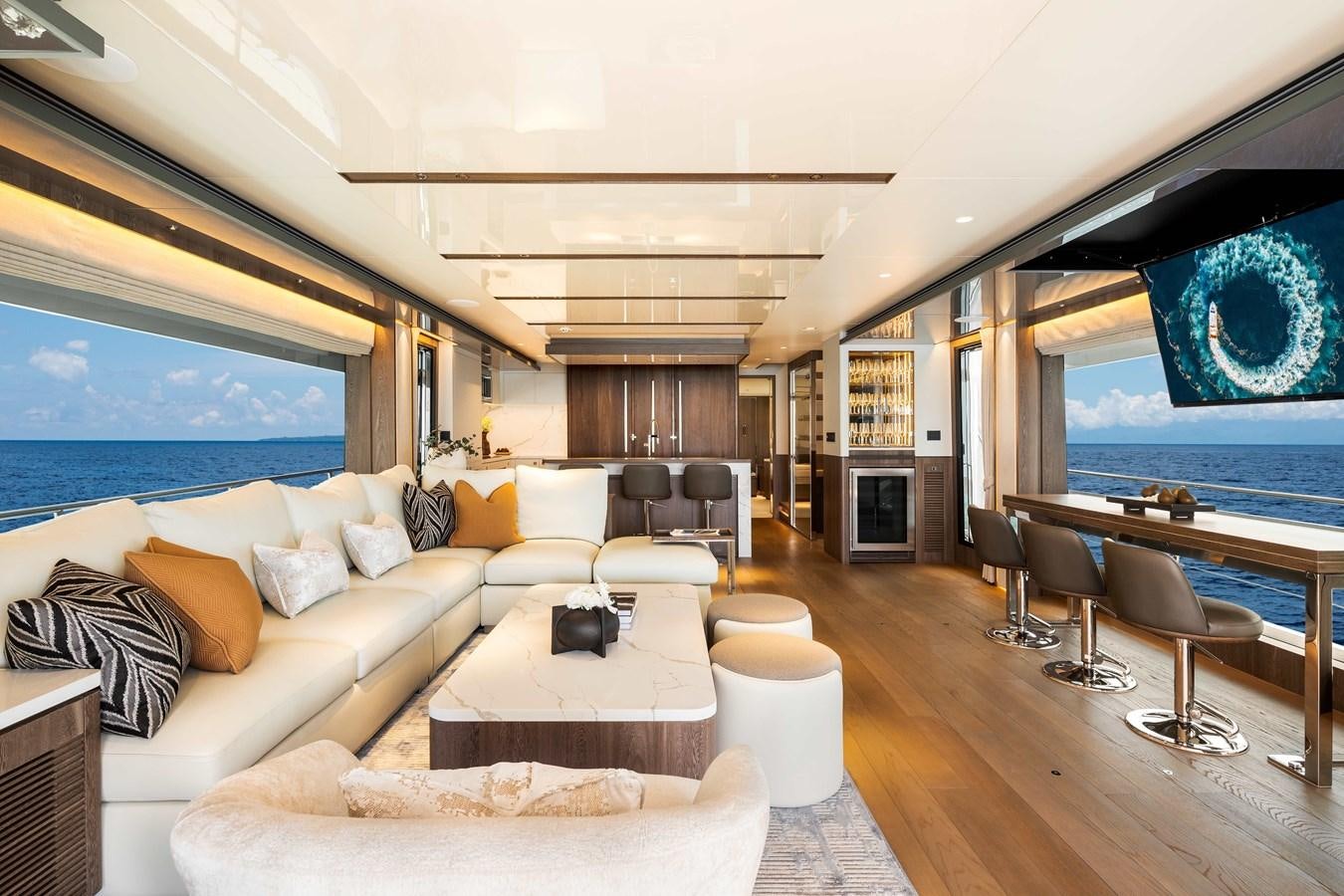a living room with a large window aboard HORIZON FD80-614 / NOW AVAILABLE  Yacht for Sale