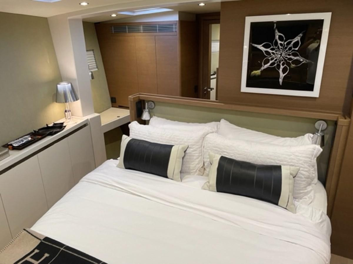 a bed with pillows aboard TROIS VIGNES Yacht for Sale