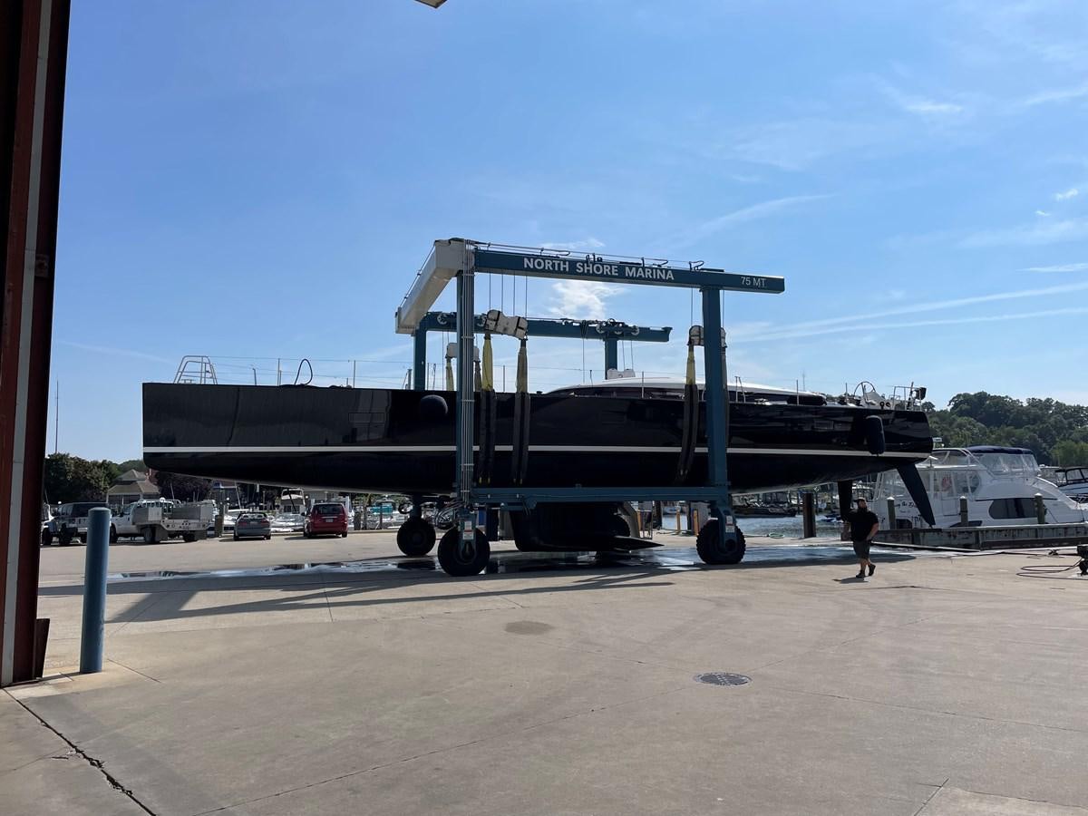 a large machine on a trailer aboard TROIS VIGNES Yacht for Sale