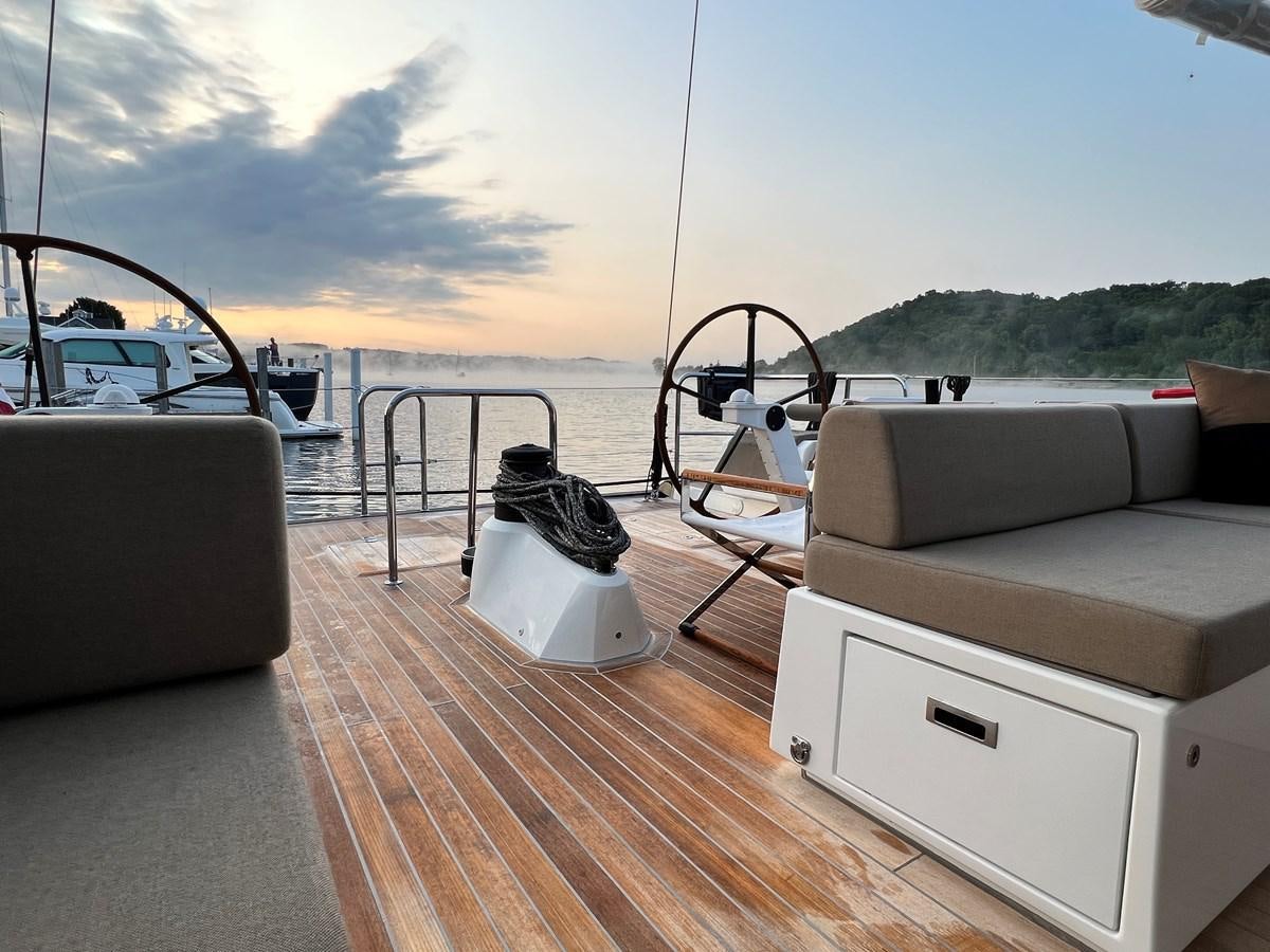 a boat on a deck aboard TROIS VIGNES Yacht for Sale