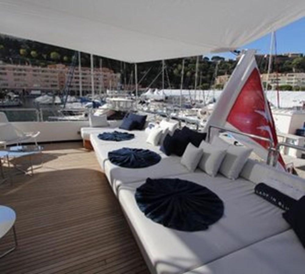 a room with a large window overlooking a city aboard LADY IN BLUE Yacht for Sale