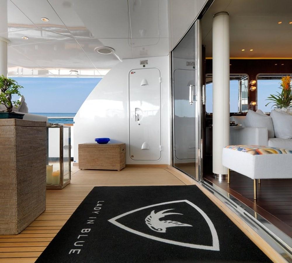 a room with a large window and a large pool aboard LADY IN BLUE Yacht for Sale