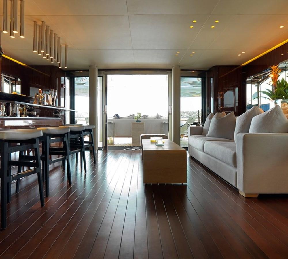 a living room with a wood floor aboard LADY IN BLUE Yacht for Sale