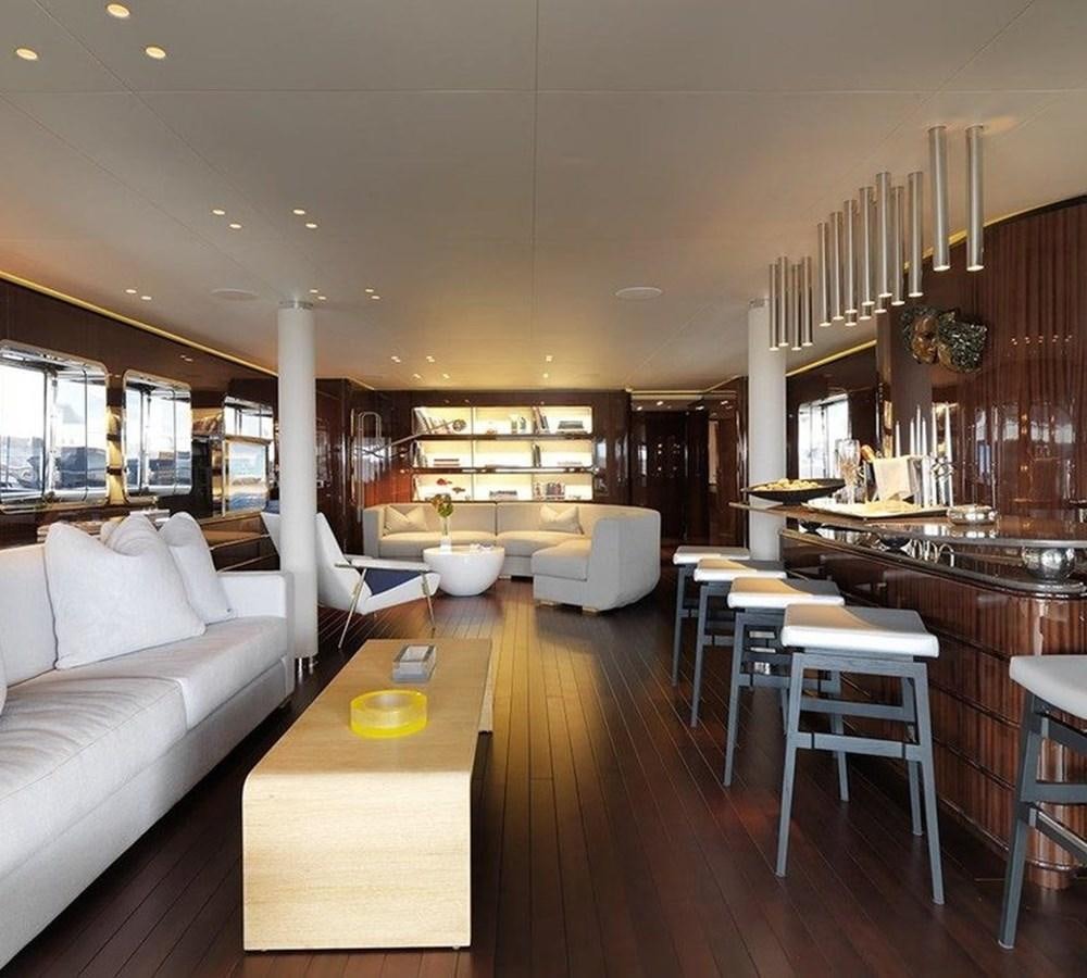 a living room with a wood floor aboard LADY IN BLUE Yacht for Sale
