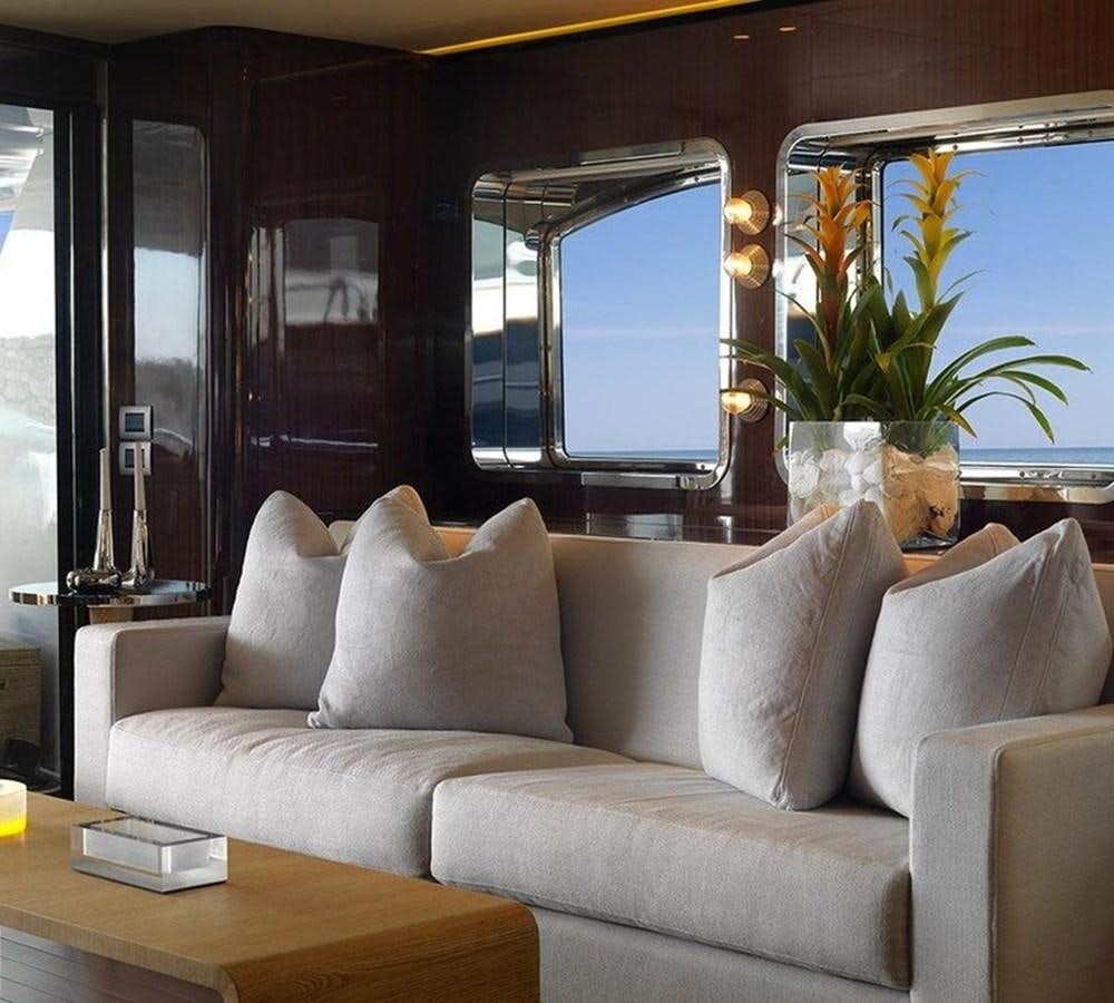 a couch in a room aboard LADY IN BLUE Yacht for Sale